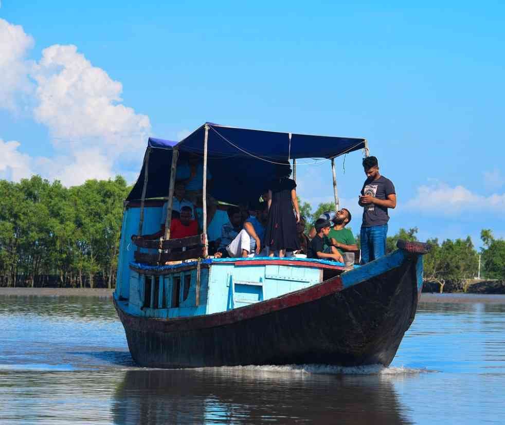 Witness a crocodile resting on the clay banks of the Sundarban river, showcasing the unique wildlife of this mangrove forest. This image captures the natural habitat and behavior of crocodiles in the Sundarbans.