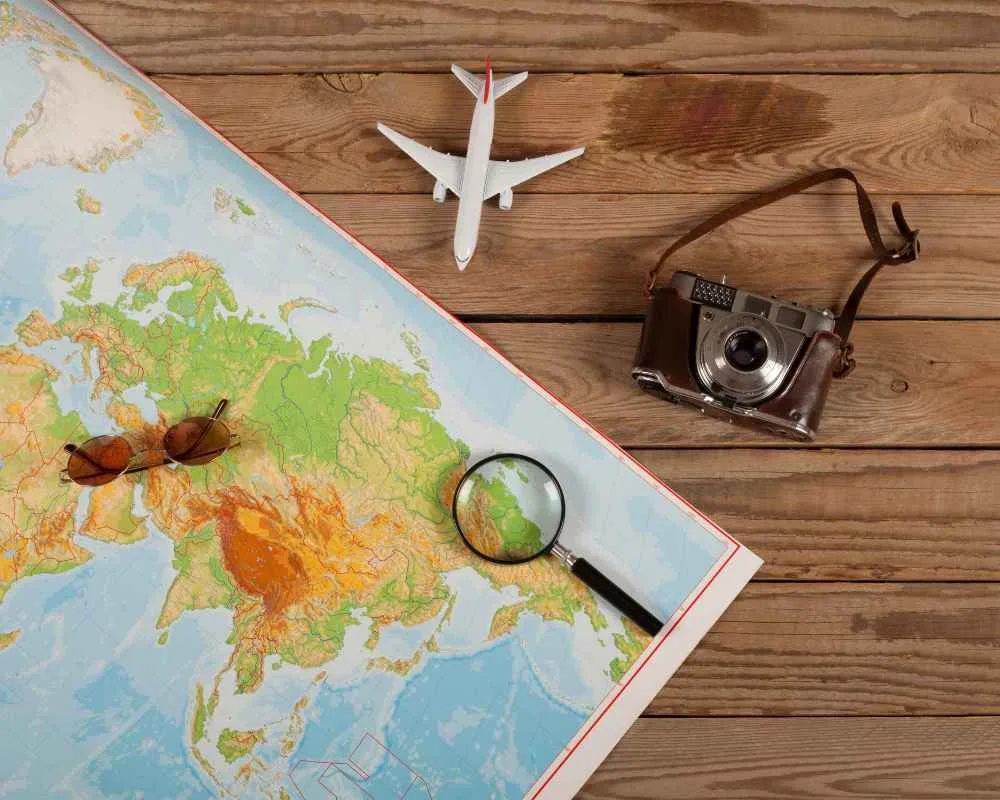 Travel table with map, camera, and planning tools for Sundarban tour