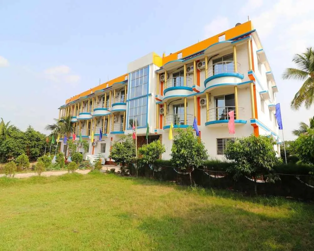 Premium Sundarban hotel with full amenities and colorful exterior
