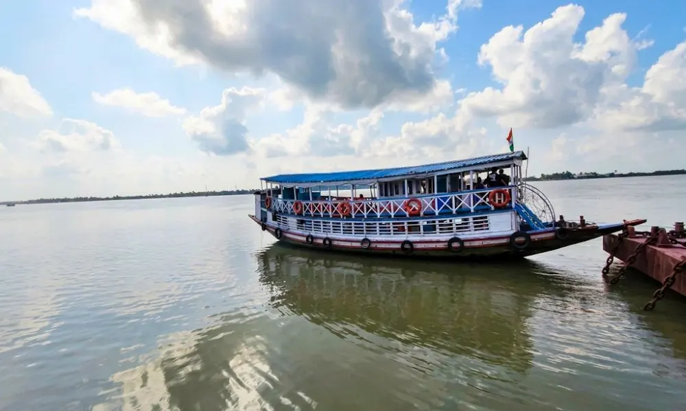 Safe Sundarban tour boat docked at ferry ghat